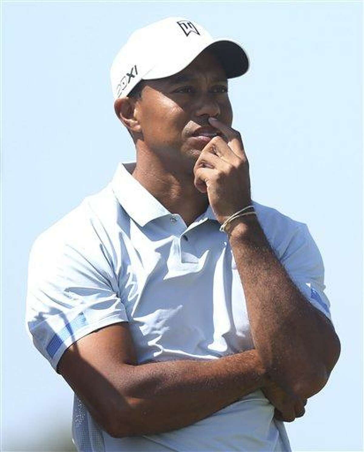 Tiger Woods of the United States prepares to play a shot off the 15th tee during the second round of the British Open Golf Championship at Muirfield, Scotland, Friday July 19, 2013. (AP Photo/Scott Heppell)