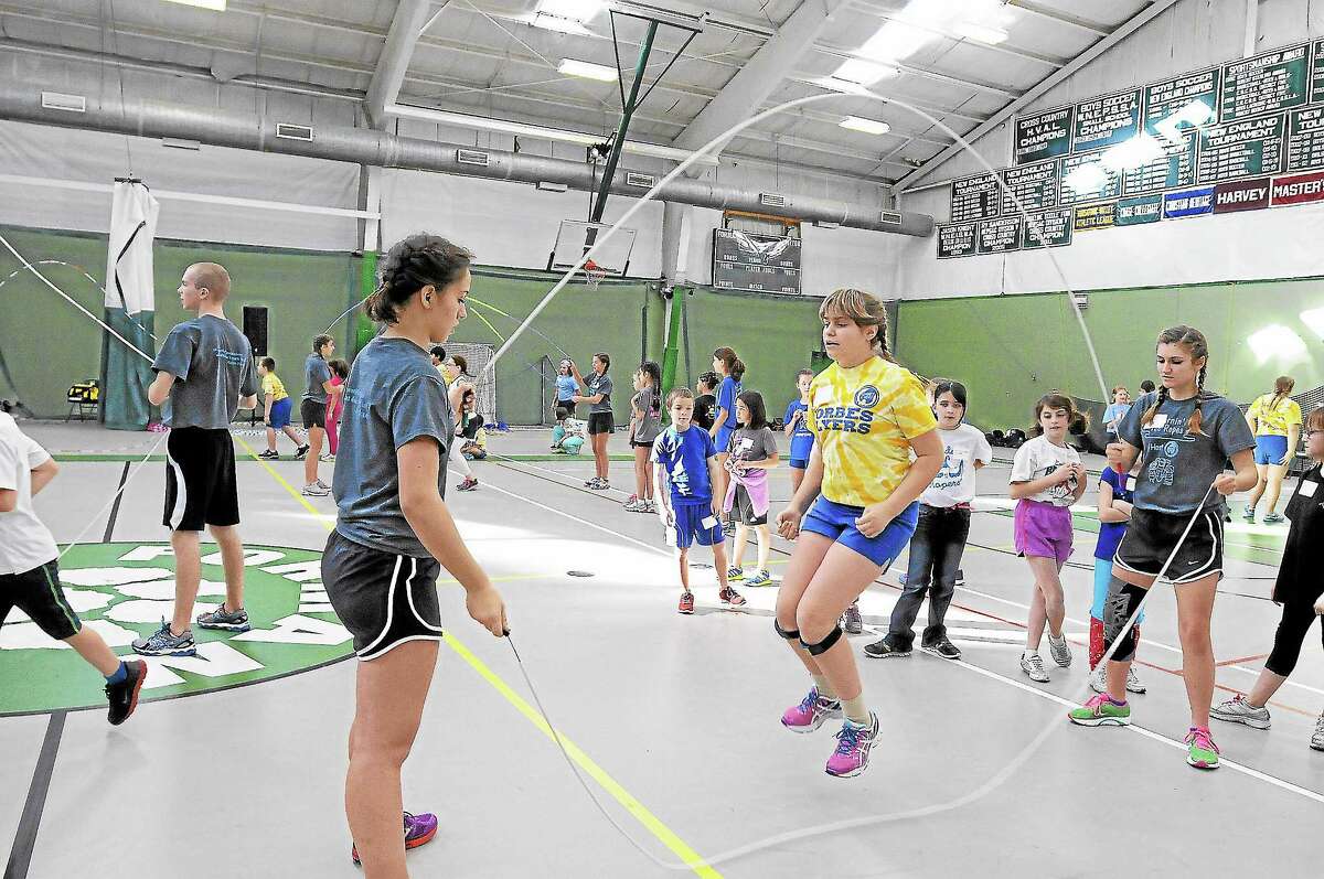 Eighth grader Ashley Civelli of the Forbes Flyers practices her moves at the Learnin’ the Ropes jump rope workshop in Litchfield Saturday. View a gallery of photos from the day at Media.RegisterCitizen.com
