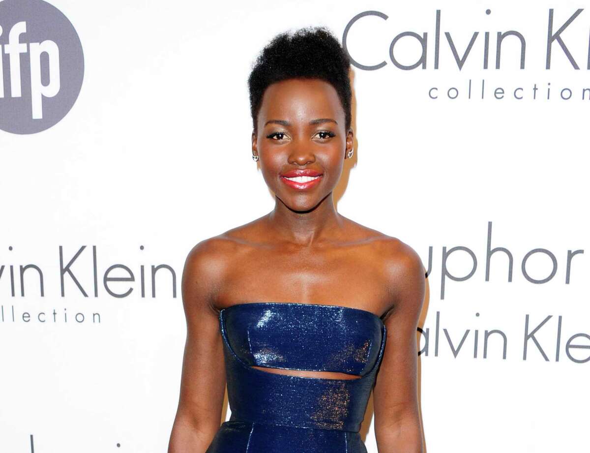 FILE - This May 15, 2014 file photo shows Lupita Nyong'o at the IFP and Calvin Klein Women In Film Party at the 67th international film festival, Cannes, southern France. The Walt Disney Co. announced Monday, June 2, that Nyongío is joining the cast of ìStar Wars: Episode VII.î The 31-year-old actress became a breakthrough star for her award-winning performance in ì12 Years a Slave.î (AP Photo/Arthur Mola/Invision/File)