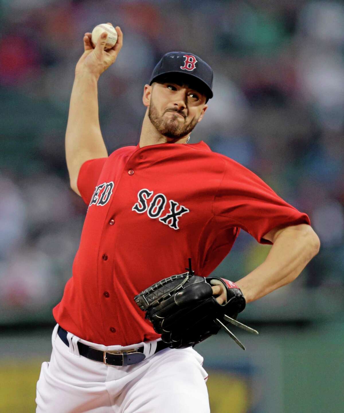 Boston Red Sox pitcher Brandon Workman delivers against the Tampa Bay Rays during the first inning of Friday’s game at Fenway Park in Boston.