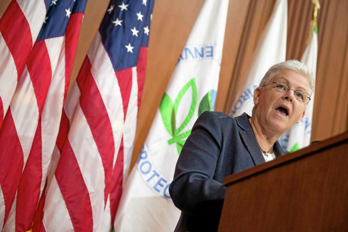 Environmental Protection Agency (EPA) Administrator Gina McCarthy speaks during an announcement of a plan to cut carbon dioxide emissions from power plants by 30 percent by 2030, Monday, June 2, 2014, at EPA headquarters in Washington. In a sweeping initiative to curb pollutants blamed for global warming, the Obama administration unveiled a plan Monday that cuts carbon dioxide emissions from power plants by nearly a third over the next 15 years, but pushes the deadline for some states to comply until long after President Barack Obama leaves office. (AP Photo/ Evan Vucci)