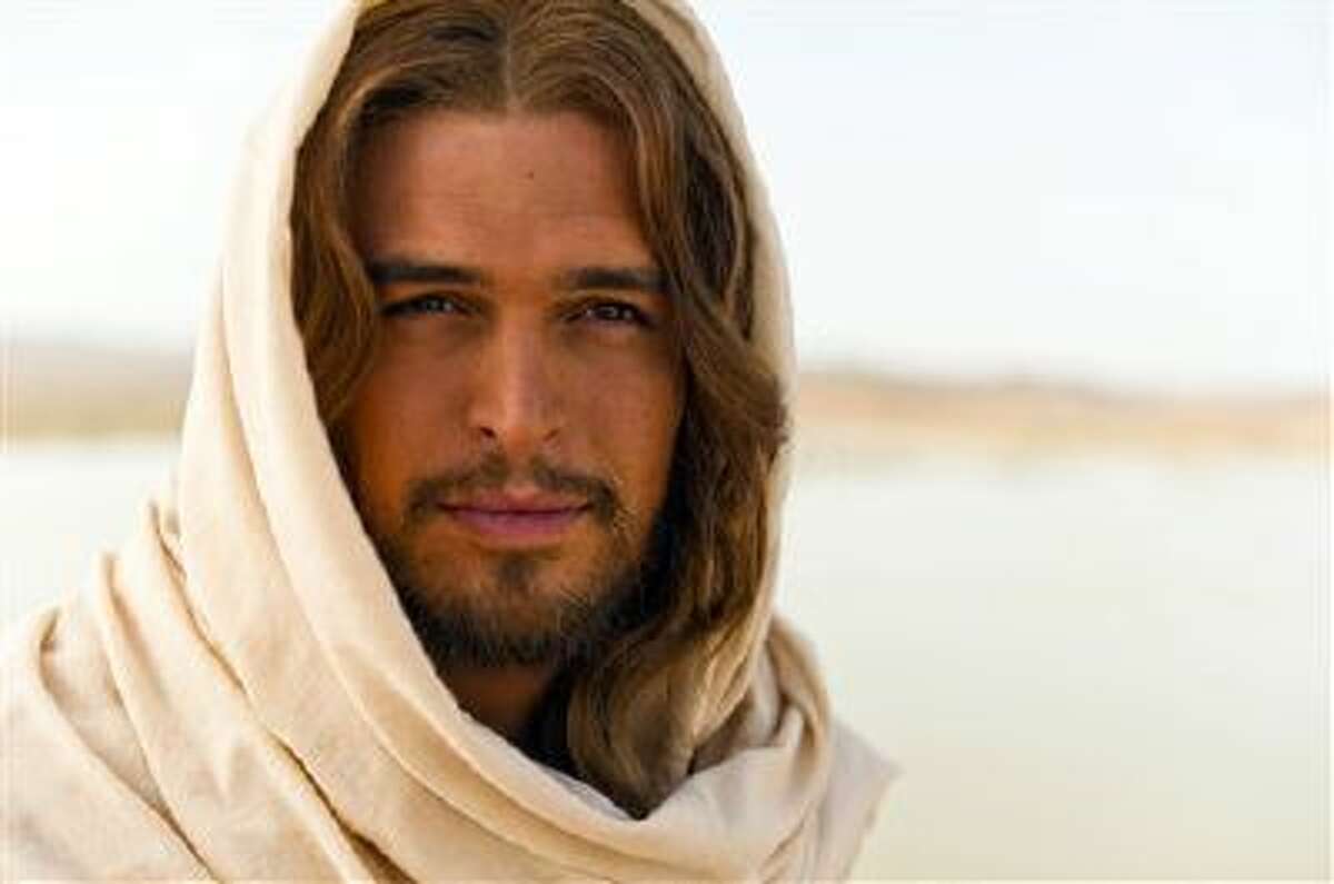 This image released by LightWorkers Media shows Diogo Morgado who plays Jesus in the film "The Bible." Mark Burnett and Roma Downey's "The Bible" franchise continues to grow in unexpected ways. Up next? A 16-city music tour featuring some of today's most popular Christian acts. The tour begins next March following the nationwide theatrical release of "The Bible" companion film "Son of God," and will feature music inspired by and visual components from the movie and miniseries.