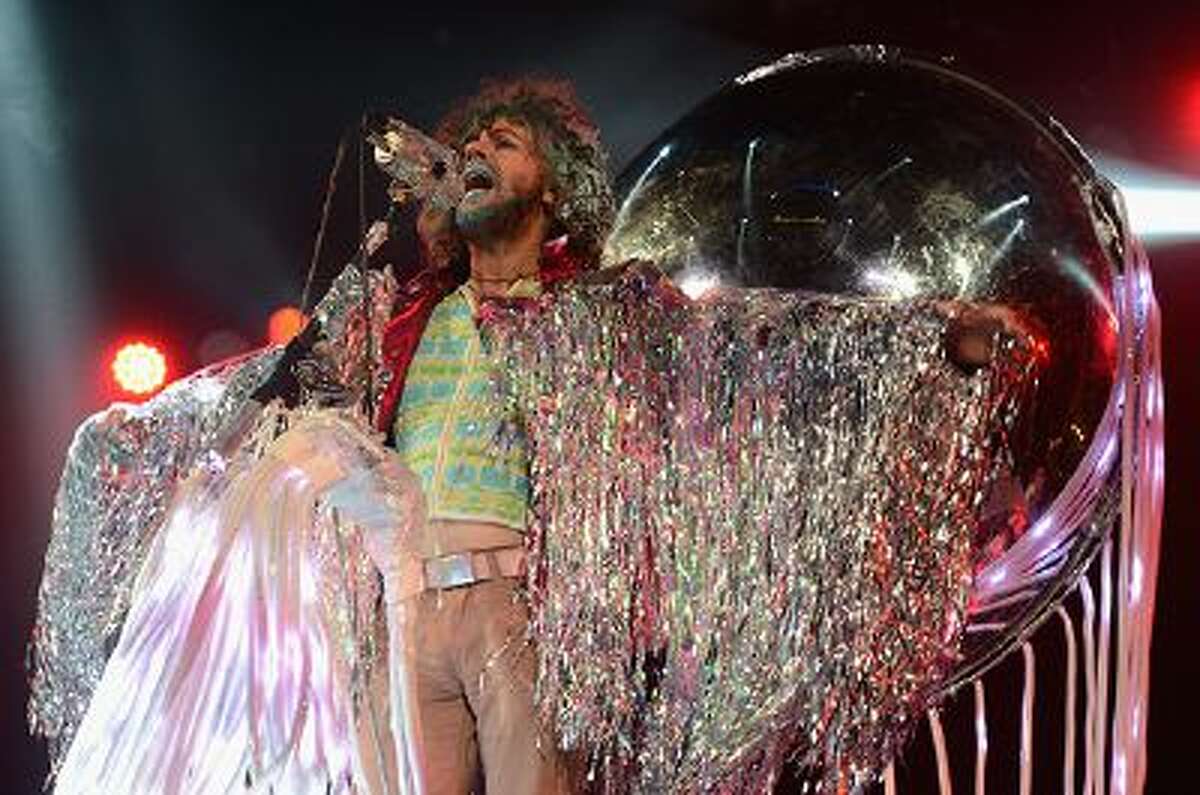 NEW YORK, NY - FEBRUARY 05: Wayne Coyne of The Flaming Lips performs onstage at the Amnesty International Concert presented by the CBGB Festival at Barclays Center on February 5, 2014 in New York City. (Photo by Theo Wargo/Getty Images for CBGB)