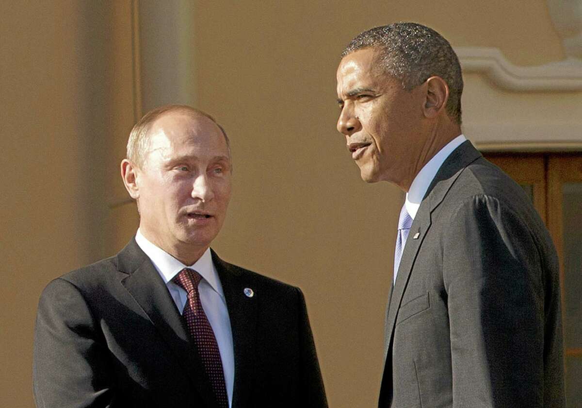 In this Sept. 5, 2013 file photo, President Barack Obama shakes hands with Russian President Vladimir Putin during arrivals for the G-20 summit at the Konstantin Palace in St. Petersburg, Russia. Congress is stepping up pressure on the White House to confront Russia over allegations that it is cheating on a key nuclear arms treaty, a faceoff that could further strain U.S.-Moscow relations and dampen President Barack Obama’s hopes to add deeper cuts in nuclear arsenals to his legacy.
