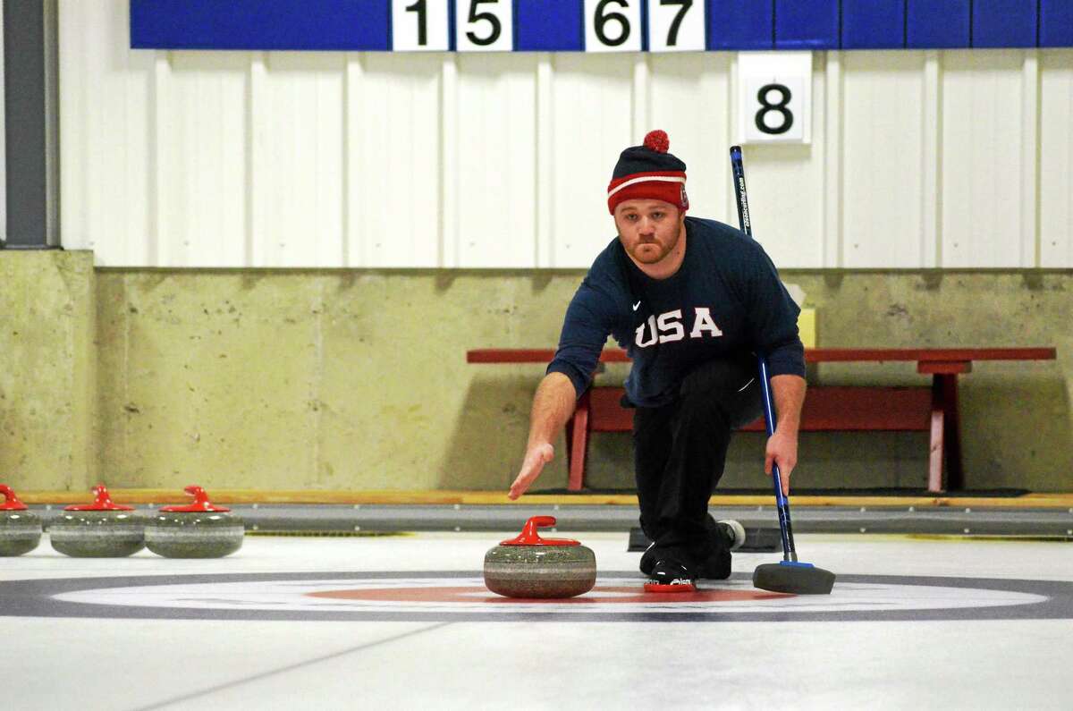 Register Citizen Sports Editor Pete Paguaga during his curling lesson at the Norfolk Curling Club on Wednesday.