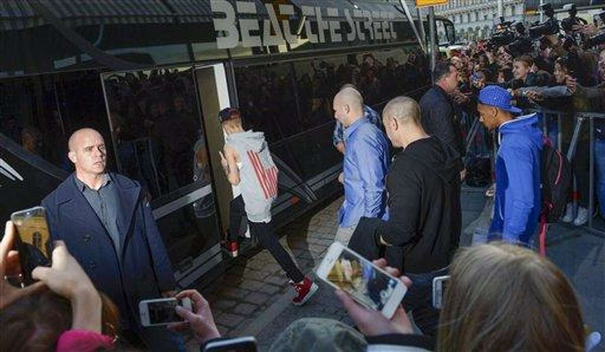 This Tuesday April 23, 2013, photo from files shows singer Justin Bieber boarding his tour bus outside Grand Hotel where Bieber was staying during his concerts in Stockholm, Sweden. Swedish police said on Thursday they found drugs on Bieber's tour bus in Stockholm, but had no suspects and were unlikely to pursue the case further. (AP Photo/Scanpix Sweden, Leo Sellen, File) SWEDEN OUT