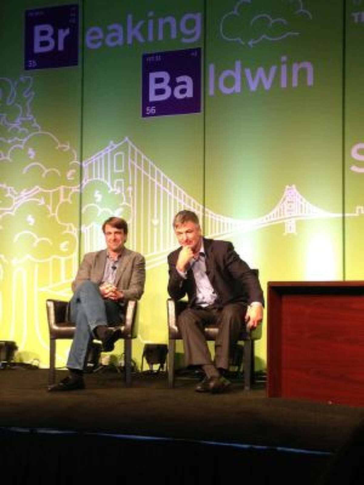 ServiceSource CEO Michael Smerklo, left, and actor, Alec Baldwin, attend a technology presentation on Nov. 20, 2013, in San Francisco.
