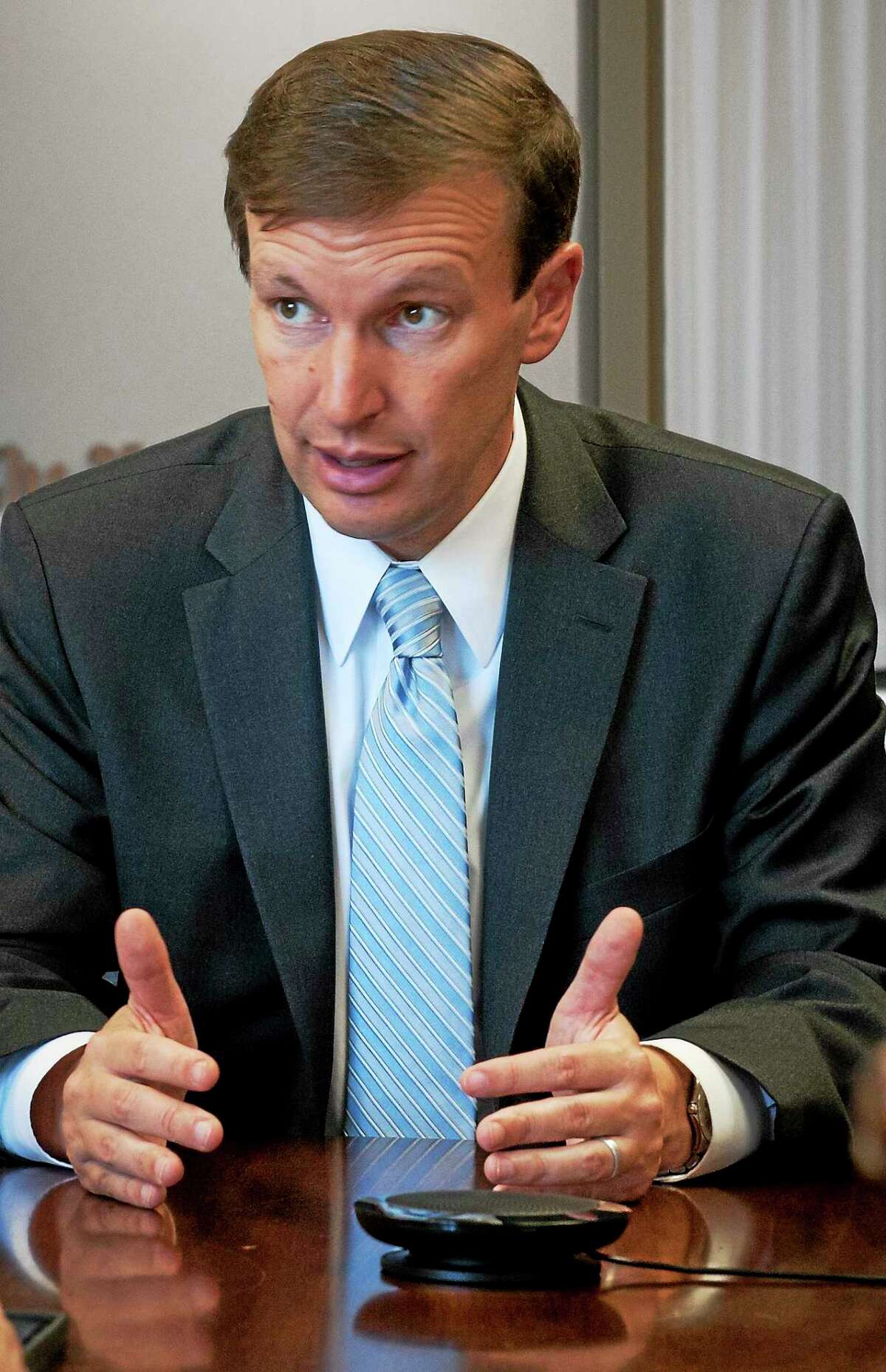 U.S. Sen. Chris Murphy talks with reporters and editors at the New Haven Register in July.