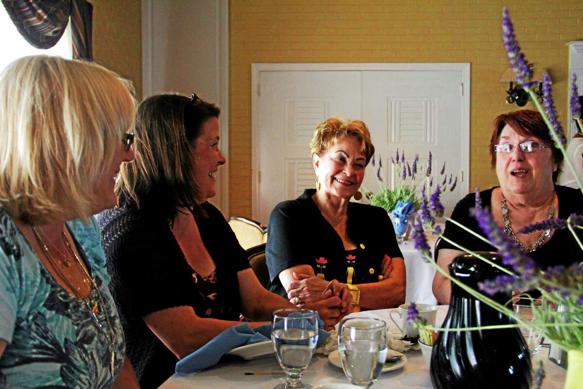 Women enjoy a conversation after lunch at P. Sams as part of Cancer Survivor Day on Sunday, June 1, 2014 in Torrington. More than 100 people attended the event, which celebrated cancer survivors and their families. Esteban L. Hernandez Register Citizen