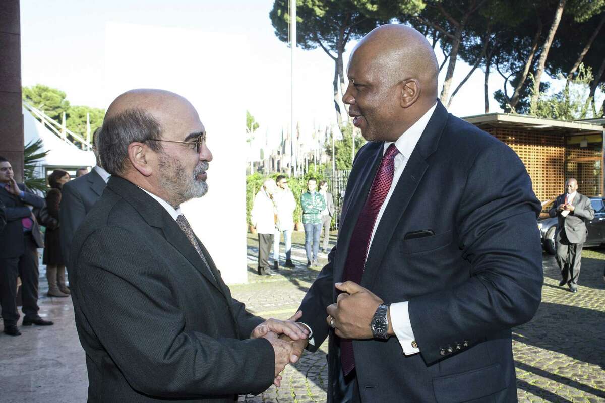 FAO Director-General Jose Graziano Da Silva, left, greets H.R.M. King Letsie III of Lesotho. prior to the opening session of the United Nations Food and Agriculture Organization (FAO) second International Conference on Nutrition, in Rome on Nov. 19, 2014. More than 170 governments pledged Wednesday to do more to prevent malnutrition around the globe.