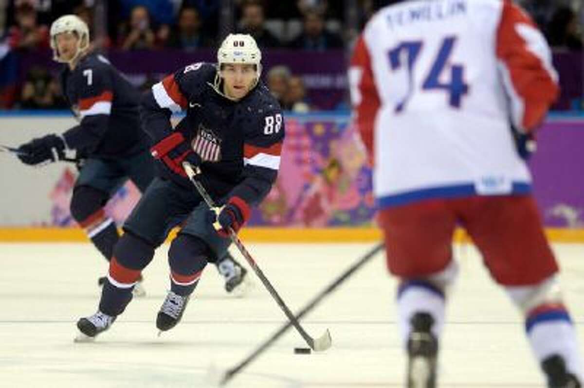 Patrick Kane (88) of the U.S.A. brings the puck up the ice against Russia during the first period of men's hockey action at Bolshoy arena. Sochi 2014 Winter Olympics on Saturday, February 15, 2014.