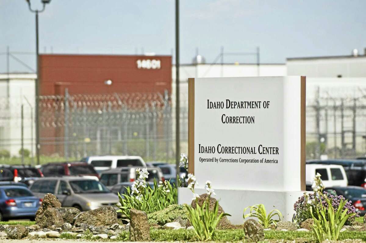 FILE - In this June 15, 2010 file photo, the Idaho Correctional Center is shown south of Boise, Idaho. A gang war that appears to have taken over parts of an Idaho private prison is spilling into the federal courts. A group of inmates at the Idaho Correctional Center is suing Corrections Corporation of America, contending the company is working with a few powerful prison gangs to control the facility and save money on staffing.(AP Photo/Charlie Litchfield, File)