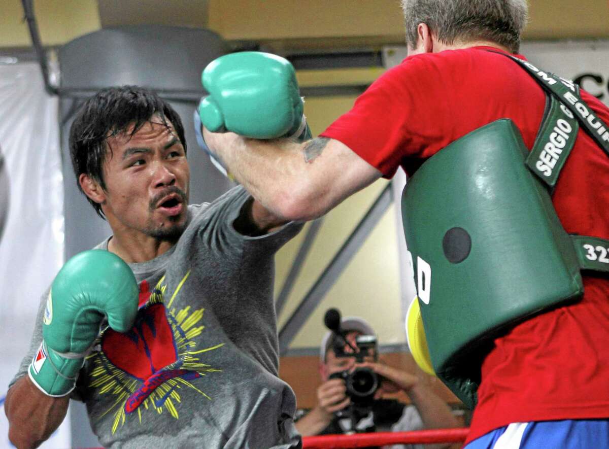 Freddie Roach, Manny Pacquiao’s trainer, was involved in a physical altercation with the entourage of opponent Brandon Rios on Wednesday, days before their fight.