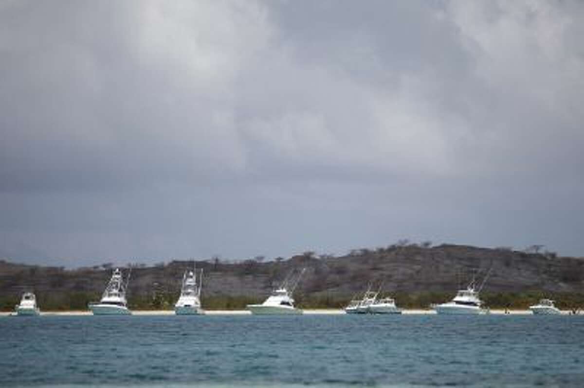 Yachts sit anchored off a beach in what was once a U.S. Naval Training Range on Vieques Island off Puerto Rico.