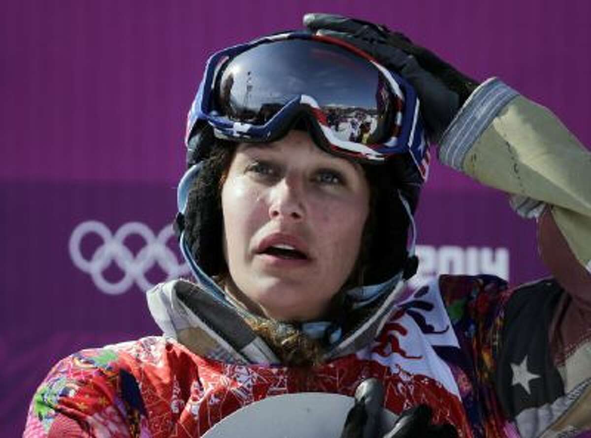 Lindsey Jacobellis of the United States reacts after winning the small final of the women's snowboard cross at the Rosa Khutor Extreme Park, at the 2014 Winter Olympics, Sunday, Feb. 16, 2014, in Krasnaya Polyana, Russia.