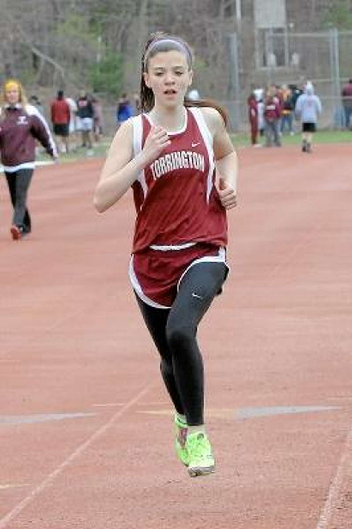 Laurie Gaboardi/Register Citizen Torrington runner Lindsey Mathieu looks to keep a steady pace