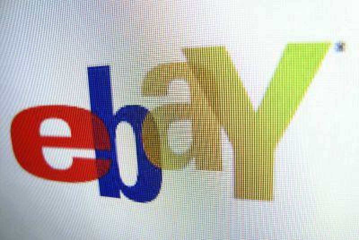 An Ebay logo is displayed on a monitor in this photo illustration in Encinitas, California, April 16, 2013. Ebay will report their earnings on Wednesday. REUTERS/Mike Blake (UNITED STATES - Tags: BUSINESS SCIENCE TECHNOLOGY LOGO)