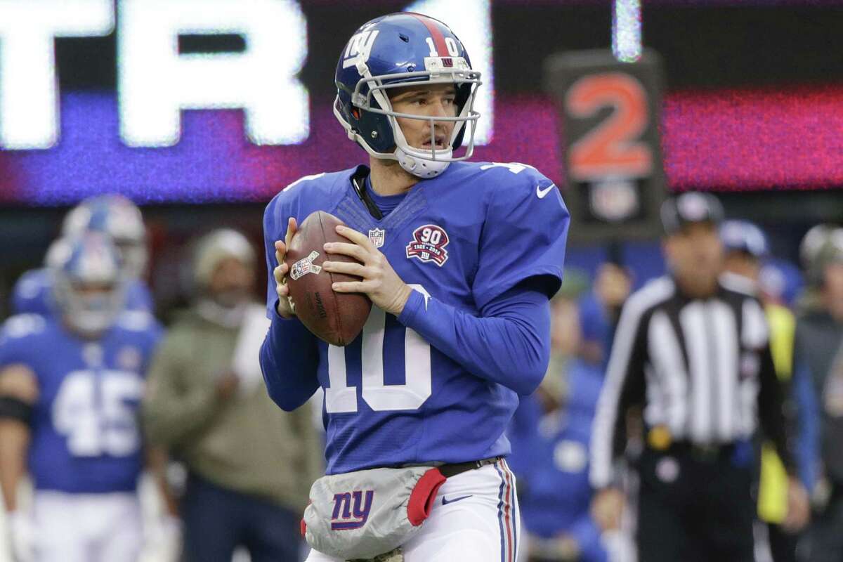 New York Giants quarterback Eli Manning releases a pass in the