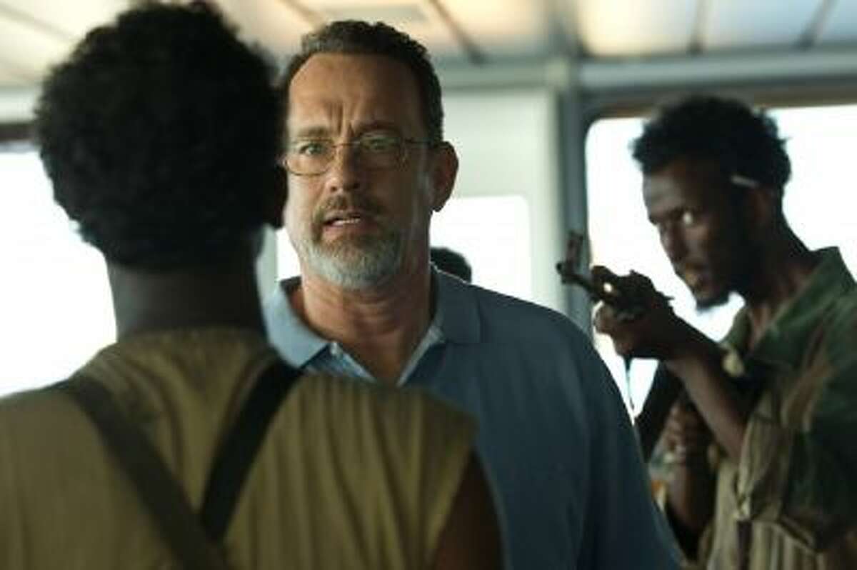 This film image released by Sony - Columbia Pictures shows Tom Hanks, center, in a scene from "Captain Phillips."