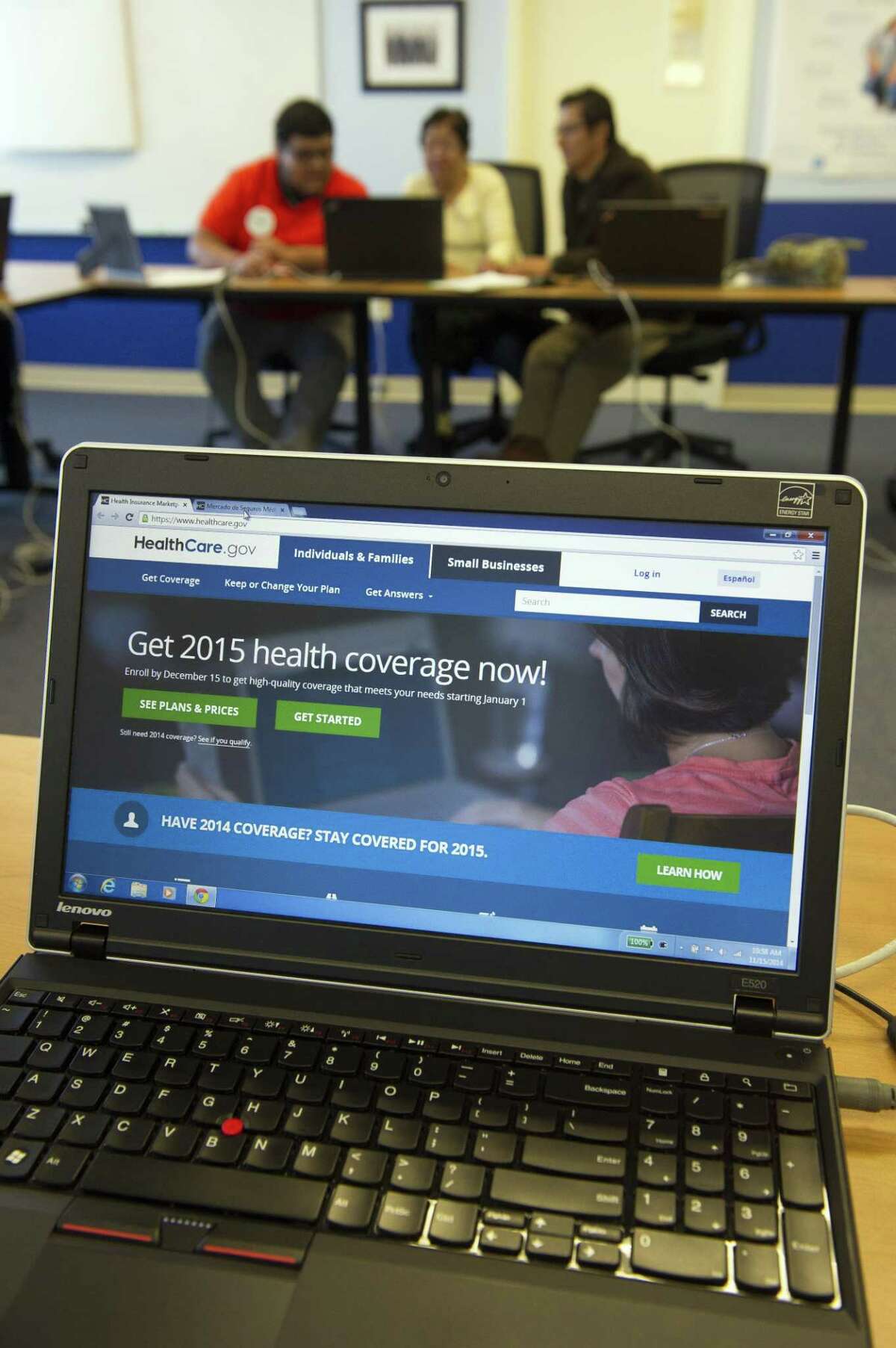 People sign up for health care coverage at the Greater Prince William Community Health Center, Evergreen Terrace Site, in Manassas, Va. on Nov. 15, 2014.