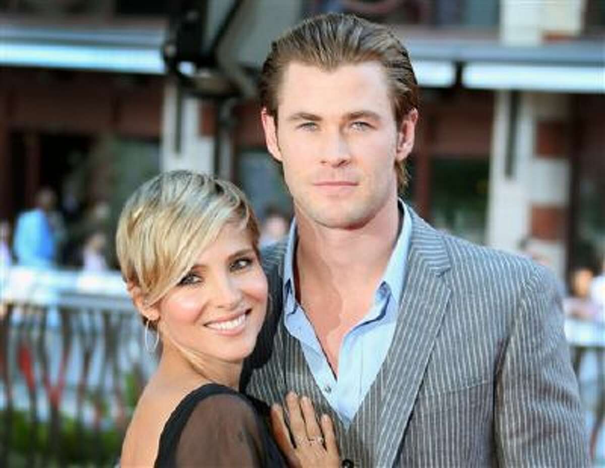This Sept. 2, 2013 file photo shows Spanish actress Elsa Pataky , left, and her husband, Australian Chris Hemsworth at the World Premiere of "Rush" at a central London cinema in Leicester Square.
