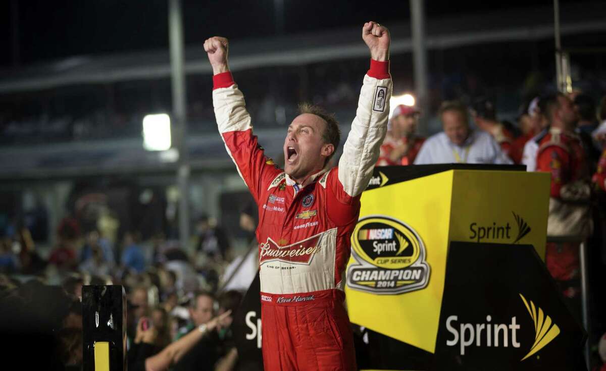 Kevin Harvick celebrates after winning the NASCAR Sprint Cup championship series race in Homestead, Fla. on Sunday.
