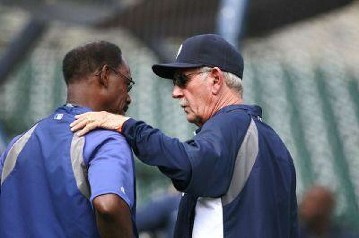 Detroit Tigers manager Jim Leyland, right, talks with Texas Rangers manager Ron Washington during batting practice before their baseball game in Detroit, Friday, July 12, 2013.