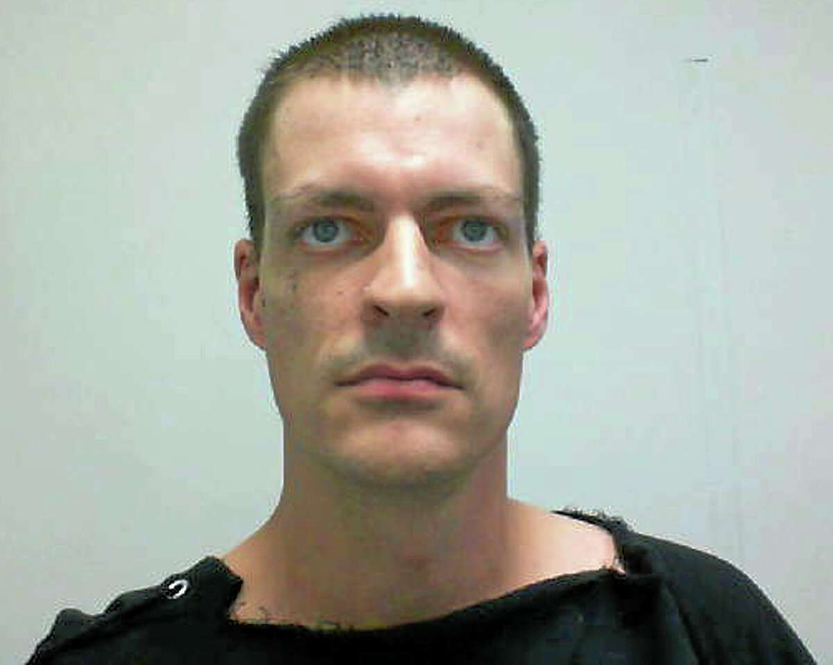 This booking photo released by the New Hampshire Attorney General's Office shows Nathaniel E. Kibby, 34, of Gorham, N.H., arrested Monday, July 28, 2014 and charged with one count of felony kidnapping of Abigail Hernandez, who went missing in Conway, N.H., in October 2013, and returned home last week. Kibby will be arraigned Tuesday in district court in Conway, N.H. (AP Photo/New Hampshire Attorney General's Office)