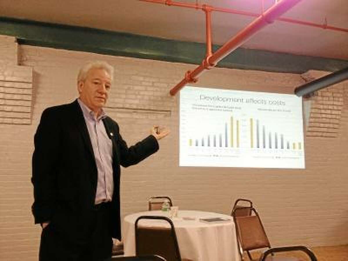 Bill Fulton, one of the vice presidents for Smart Growth America, told the town officials in attendance that Winsted would need to build up downtown and attract more young residents to help build the town's tax base. JASON SIEDZIK/ Register Citizen
