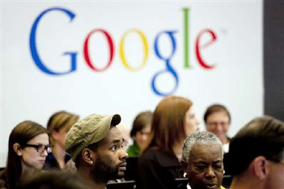 People are shown attending a workshop at Google offices in New York.