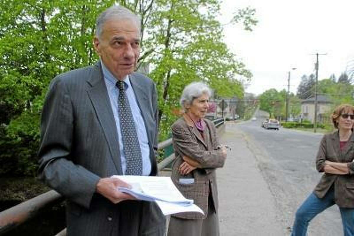 Register Citizen File Photo - Ralph Nader stands on the Holabird Avenue Bridge in Winsted in May 2013, which town officials say must be replaced.