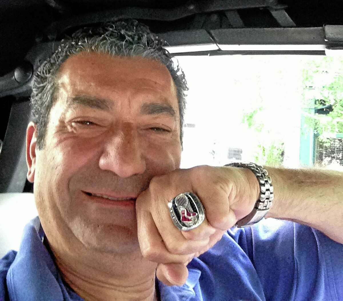 New York Yankees fan Militello displays the 2013 Red Sox World Series ring he found at his New York restaurant on Thursday night. Militello returned the ring on Friday to Drew Weber, who owns one of Boston’s minor league teams.