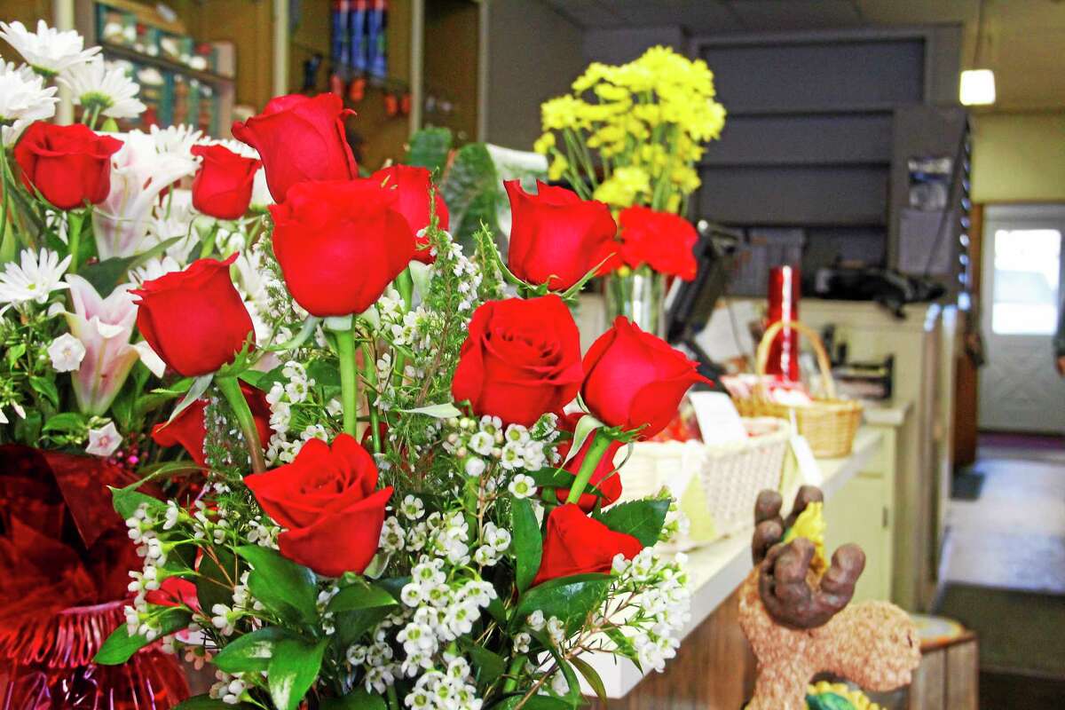 A dozen red roses remain the most popular item at Flower Girl and Greenhouse Gifts, seen here on Friday, Feb. 14, 2014 in Torrington.