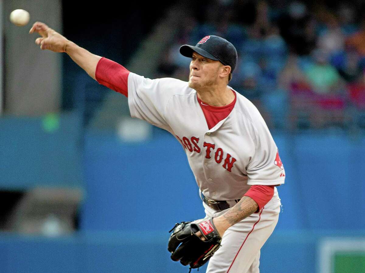 The Boston Red Sox traded starting pitcher Jake Peavy to the San Francisco Giants on Saturday.