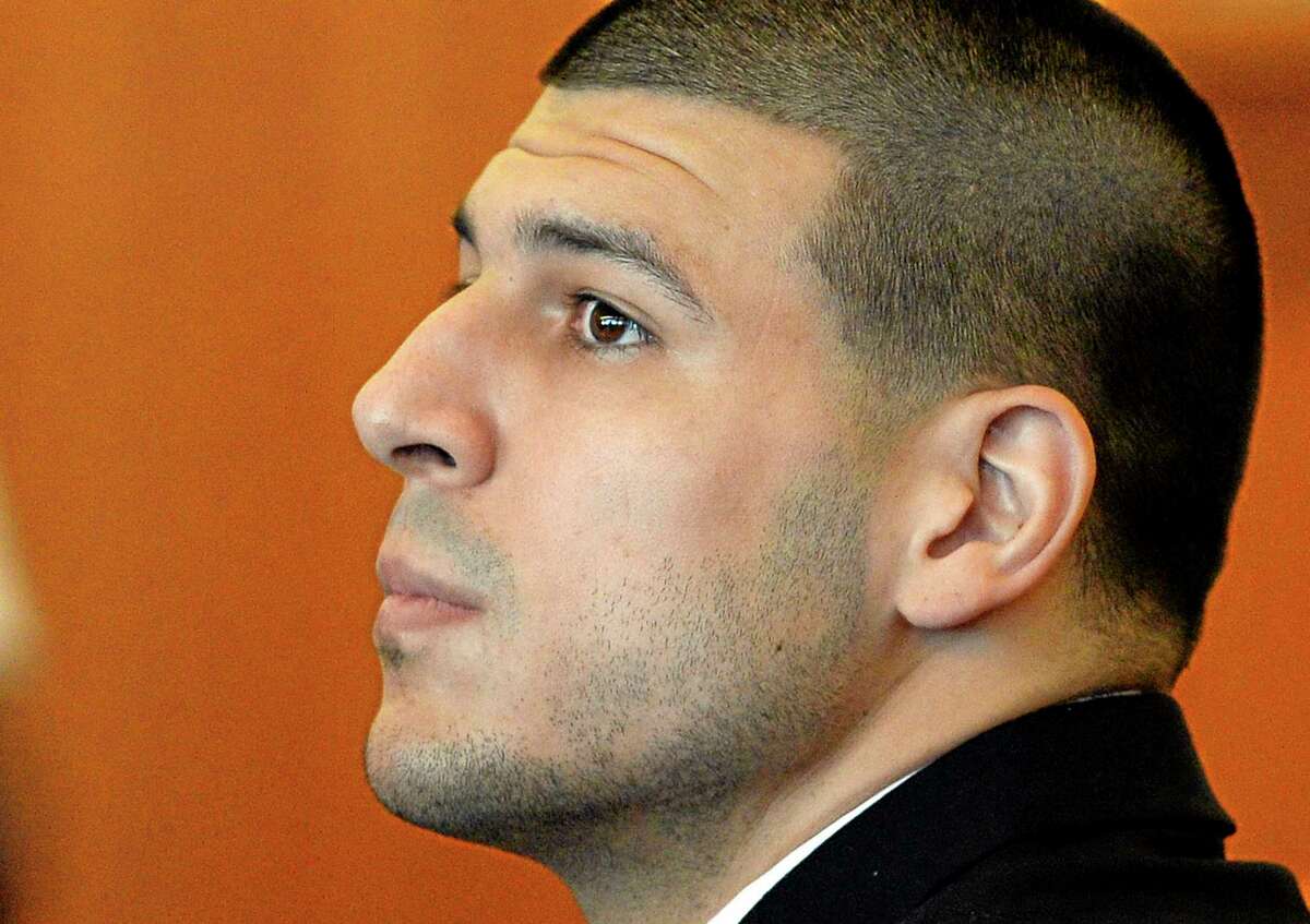 Aaron Hernandez watches during a hearing in Bristol County Superior Court Tuesday in Fall River, Mass.