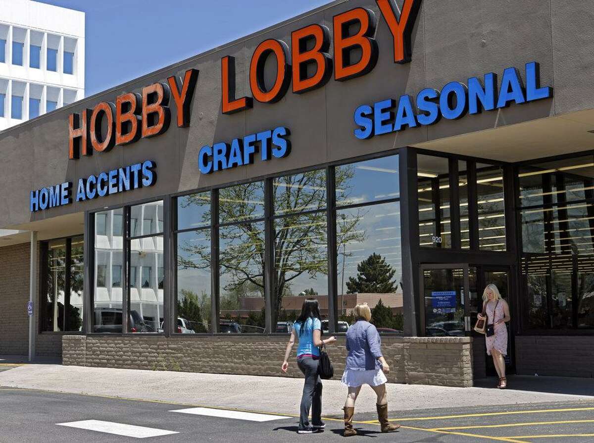 In this May 22, 2013 file photo, customers enter and exit a Hobby Lobby store in Denver. Ed Andrieski - The Associated Press.