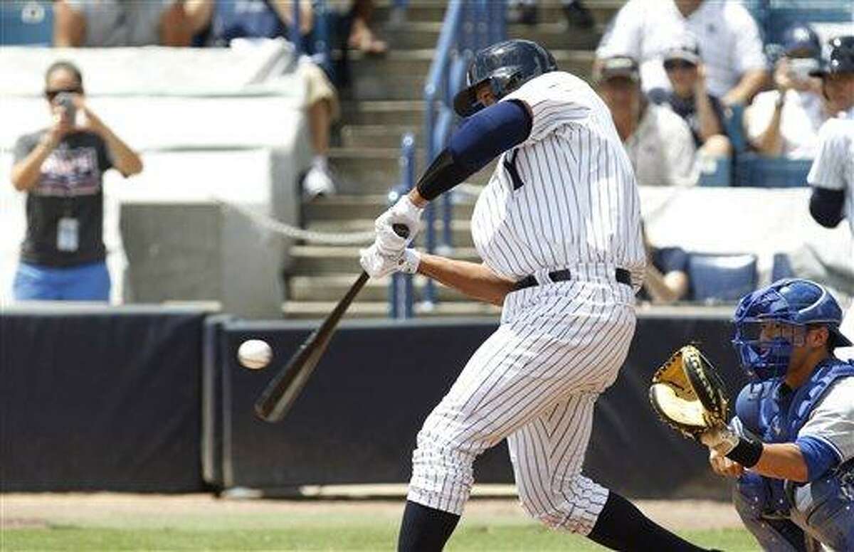 New York Yankees' Alex Rodriquez bats for the Tampa Yankees against the Dunedin Blue Jays in a minor league baseball rehab game in Tampa, Fla., Wednesday, July 10, 2013. (AP Photo/Scott Iskowitz)