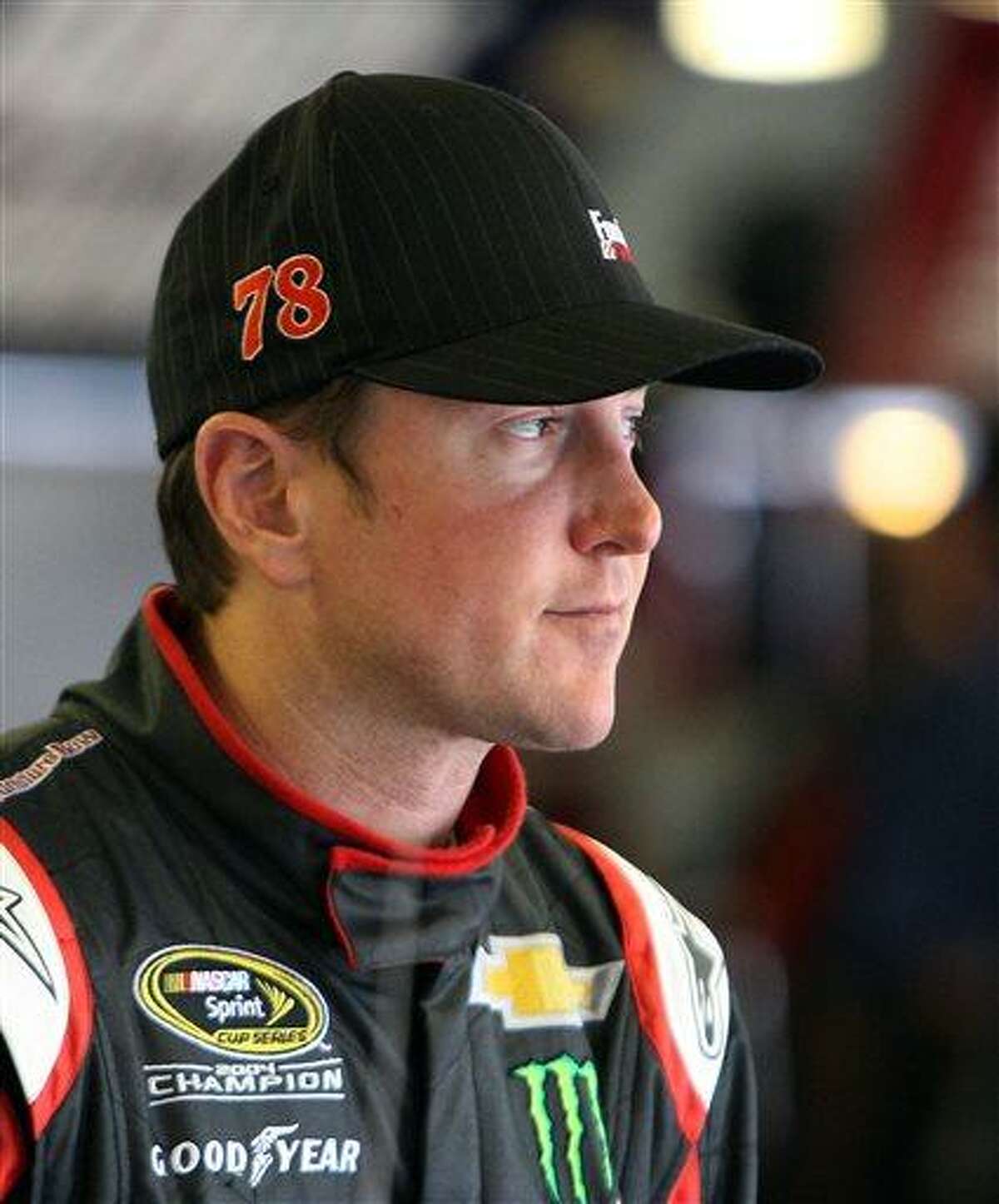 Kurt Busch gets ready for the final practice before Sunday's NASCAR Sprint Cup auto race at New Hampshire Motor Speedway, Saturday, July 13, 2013 in Loudon, N.H. (AP Photo/Jim Cole)