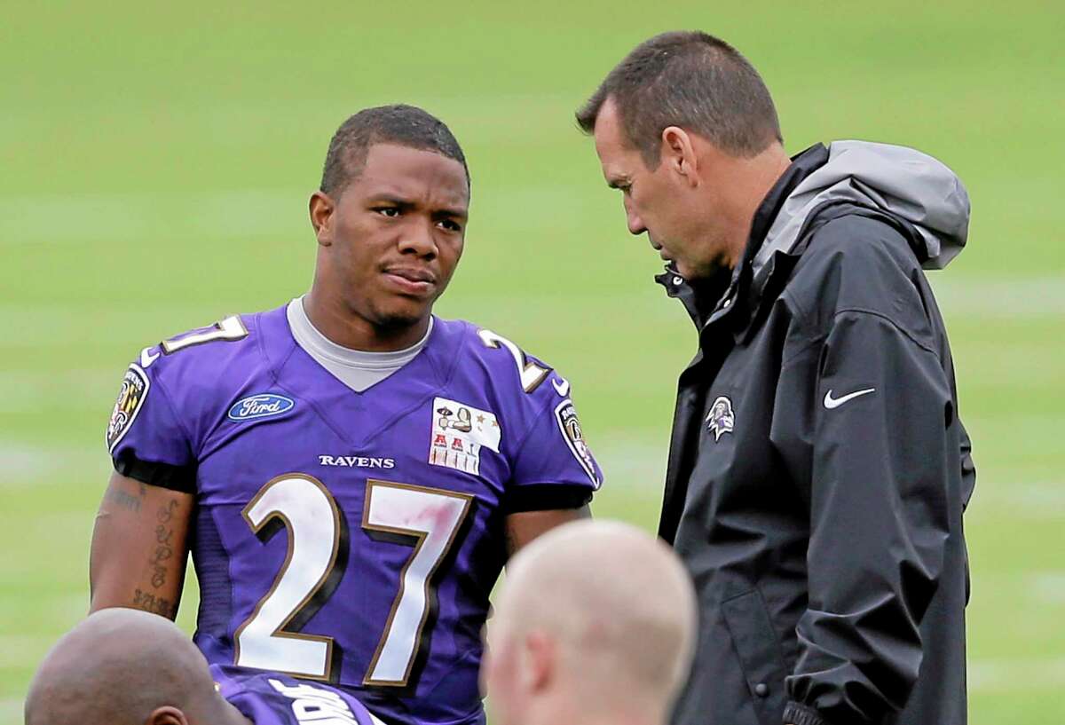 Baltimore Ravens running back Ray Rice speaks with offensive coordinator Gary Kubiak at the end of Thursday’s practice at the team’s facility in Owings Mills, Md.