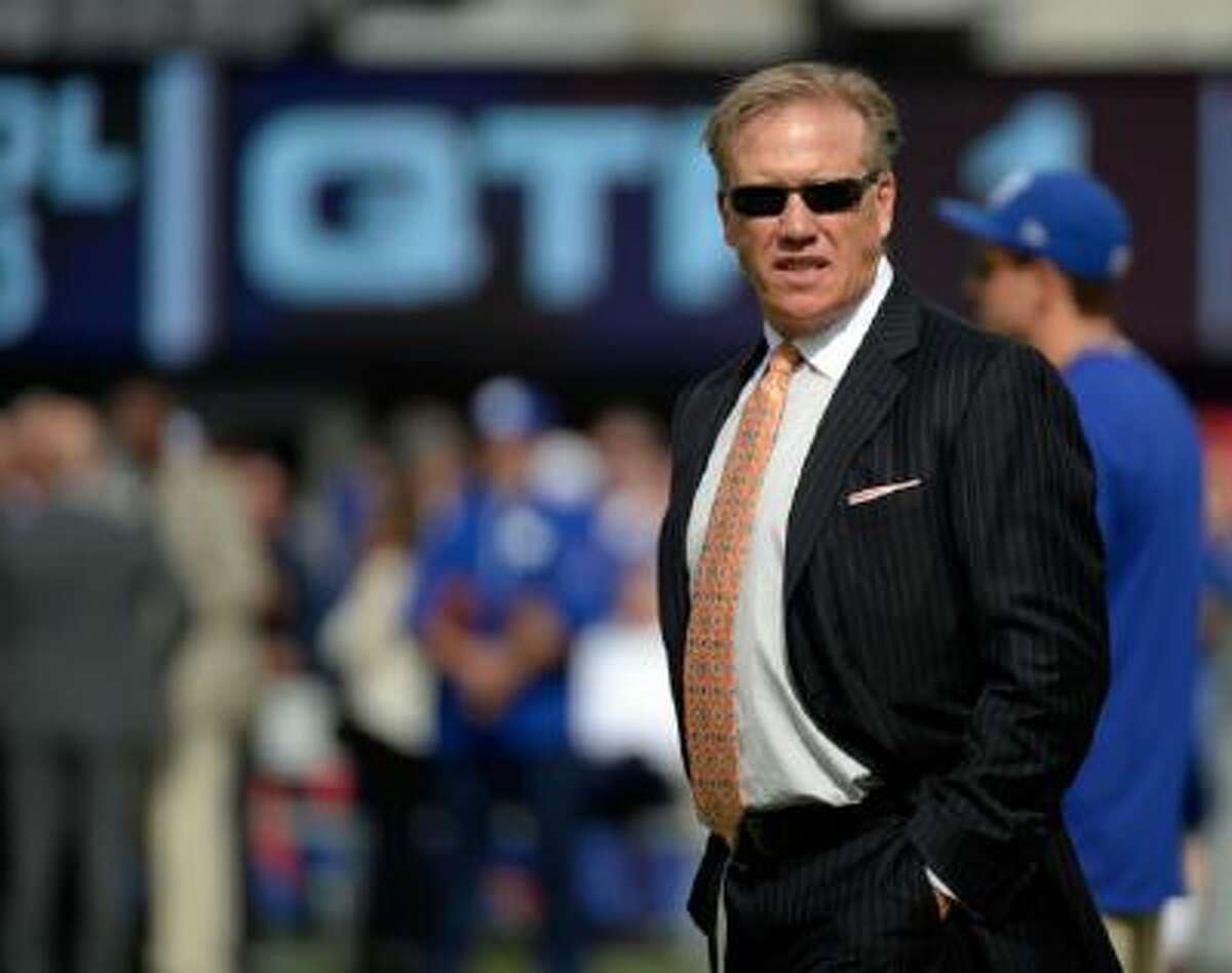 Broncos executive VP of football operations John Elway is now also the team's general manager.