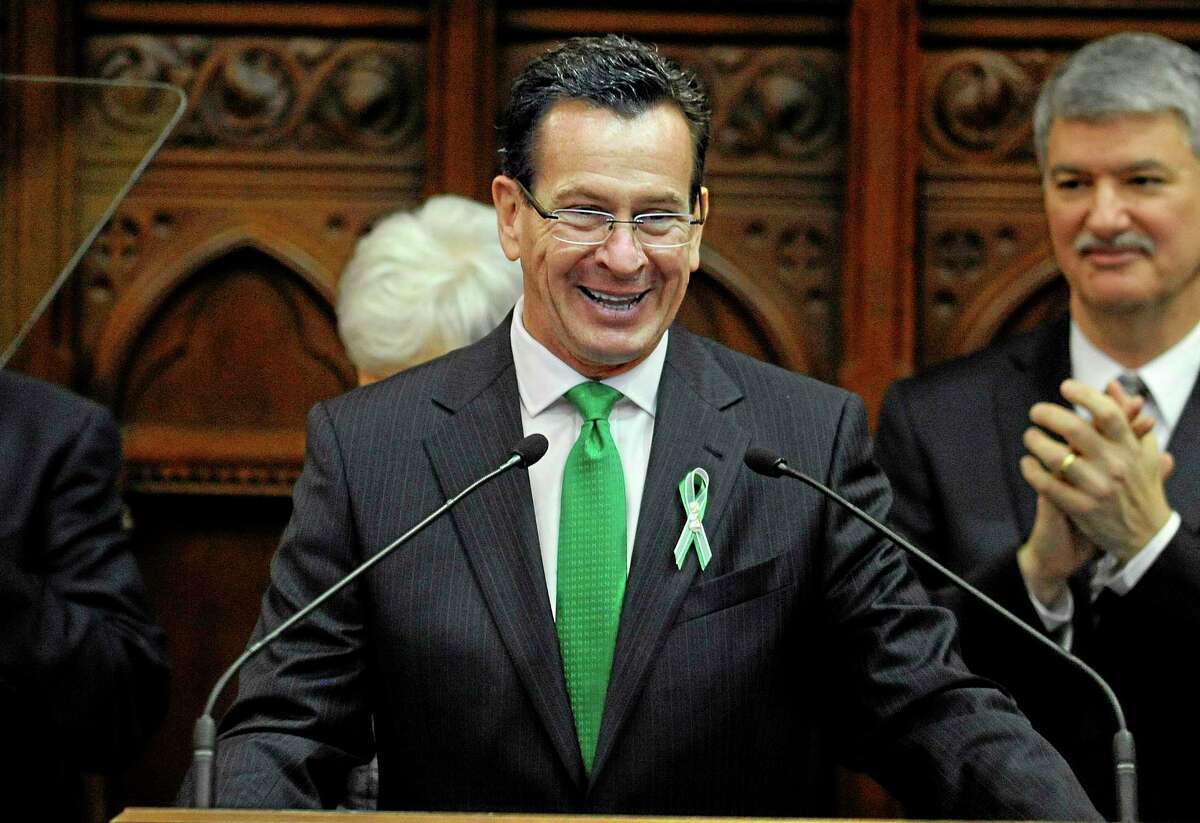 Connecticut Gov. Dannel P. Malloy delivers his State of the State address to the House and the Senate at the Capitol in Hartford, Conn., Wednesday, Jan. 9, 2013. Gun control, mental health care and school safety are expected to be major topics in the new session. Legislators also must grapple with a projected deficit of about $1.2 billion. (AP Photo/Jessica Hill)