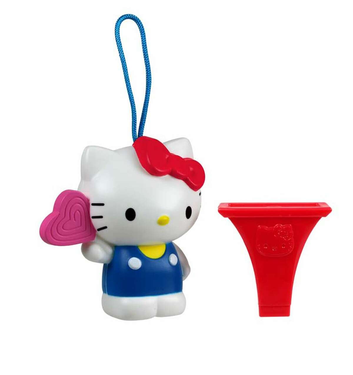 This undated image provided by the U.S. Consumer Product Safety Commission shows a “Hello Kitty Birthday Lollipop” whistle, which McDonald’s gave to children in Happy Meals.