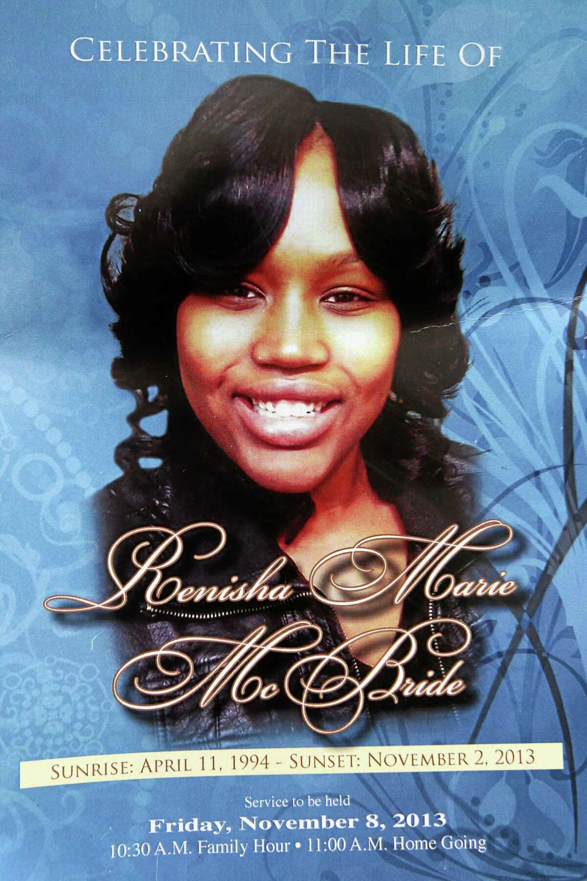 In this Nov. 8, 2013 file photo is the front cover of a funeral program for 19-year-old Renisha McBride from a service at House of Prayer & Praise Cathedral in Detroit. Prosecutors announced Thursday, Nov. 14, 2013 that they have scheduled a news conference Friday in Detroit to announce whether they'll charge a suburban Detroit homeowner in the shooting death of McBride. (AP Photo/Detroit Free Press, Brian Kaufman) DETROIT NEWS OUT; NO SALES;