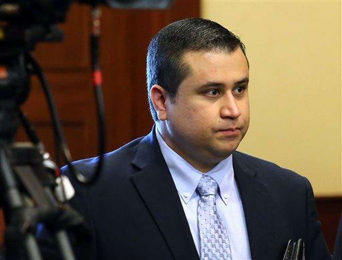 George Zimmerman arrives in the courtroom for his trial at the Seminole County Criminal Justice Center, in Sanford, Fla., Friday, July 12, 2013. Zimmerman is charged in the 2012 shooting death of unarmed teenager Trayvon Martin. (AP Photo/Orlando Sentinel, Joe Burbank, Pool)