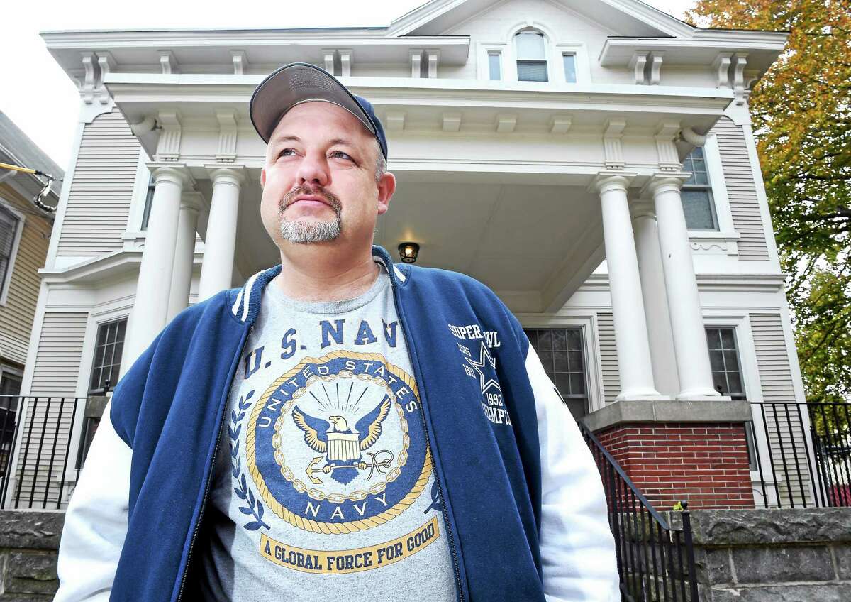 Veteran Richard Deso is photographed outside Harkness House in New Haven.