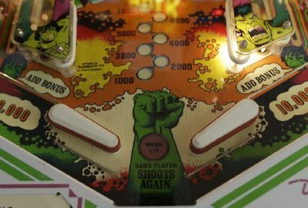 Flippers and bumpers are shown on the 1979 Incredible Hulk pinball machine at the Seattle Pinball Museum in Seattle.