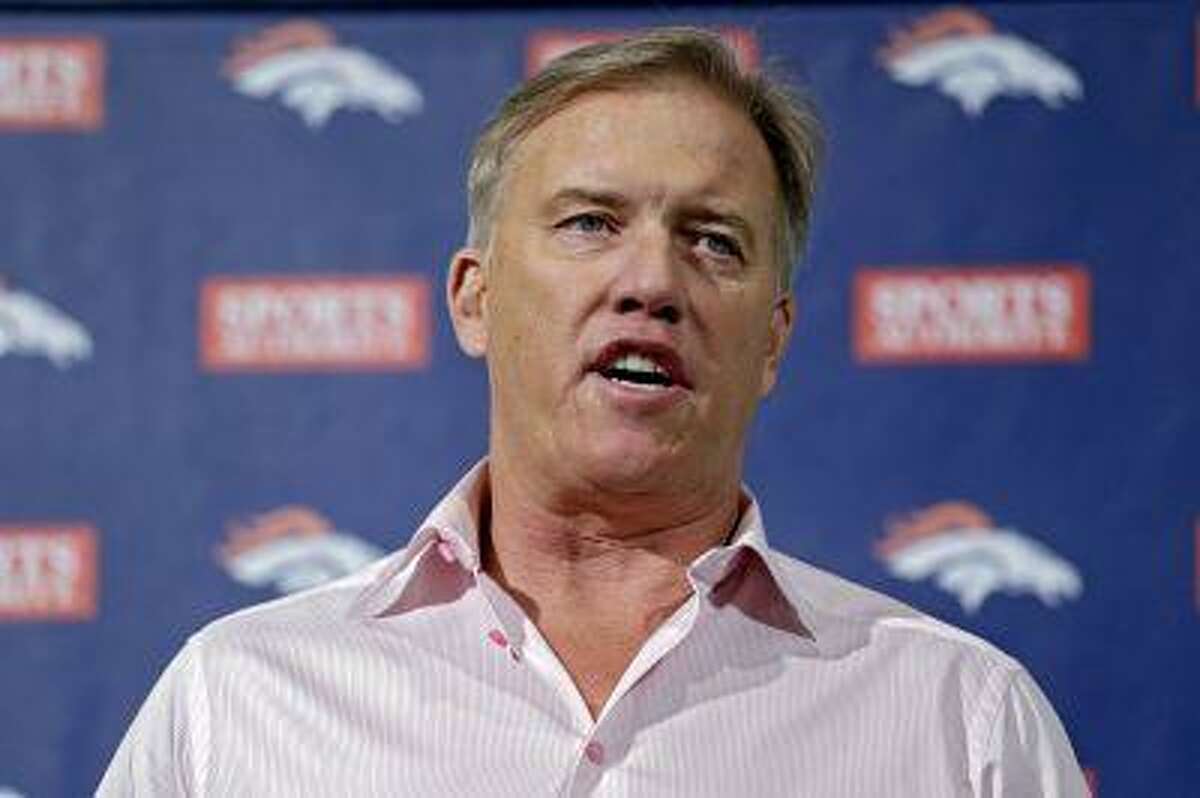 Denver Broncos vice president John Elway speaks at a news conference at the NFL football team's headquarters in Englewood, Colo., on Thursday, March 14, 2013.