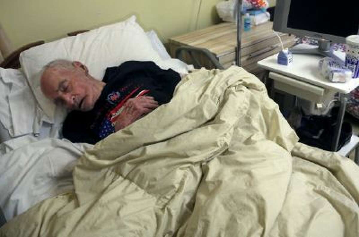 Morris Markowitz sleeps in his room at the Crown Nursing and Rehabilitation Center in the Brooklyn borough of New York.