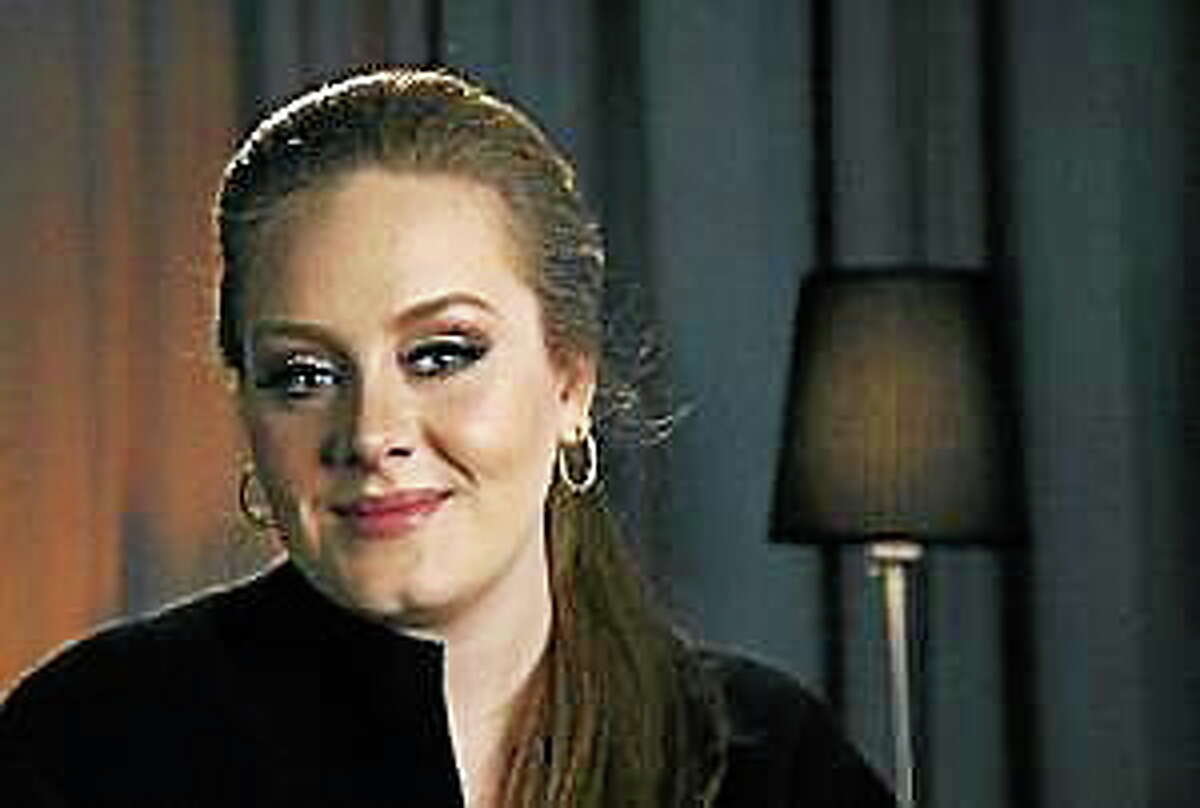 In this Feb. 10, 2011, photo, recording artist Adele poses for a portrait in New York.