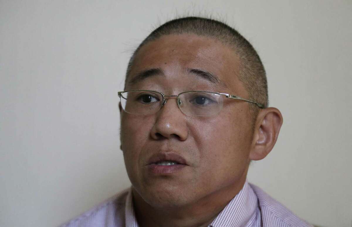 FILE - In this Sept. 1, 2014 file photo, Kenneth Bae speaks to the Associated Press in Pyongyang, North Korea. The US announces Saturday the release of Americans Bae and and Matthew Todd Miller who were detained in North Korea, saying they're on way home. (AP Photo/Wong Maye-E, File)